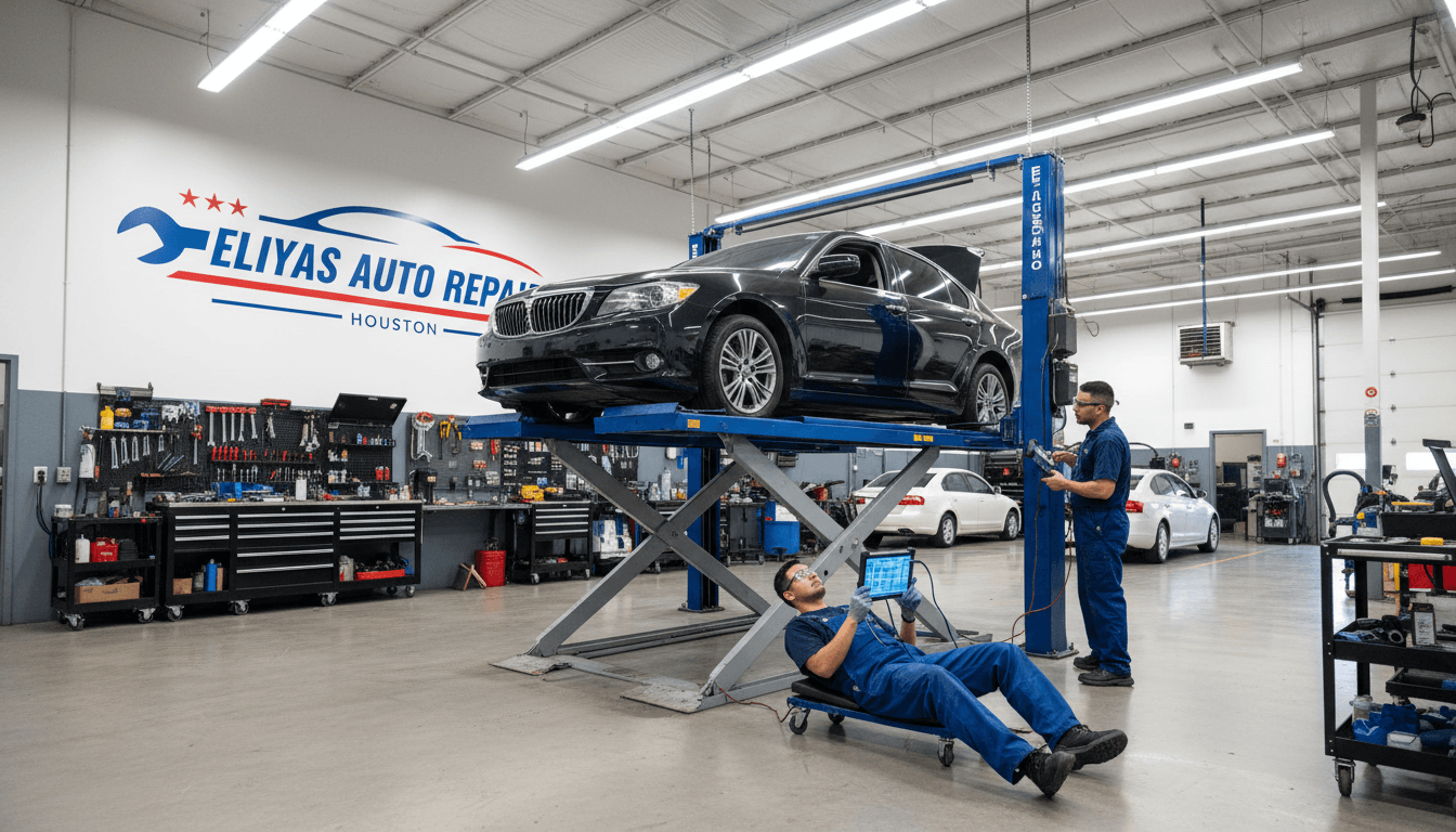 Car on lift at Eliyas Auto Repair in Houston, mechanic working with tools